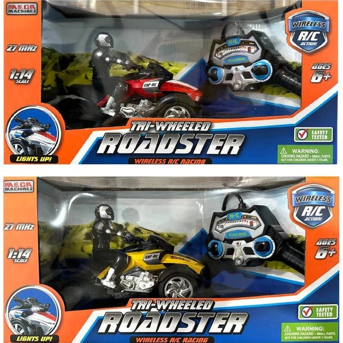 Two boxed "Mega Machines" R/C trikes. The top trike is red, and the bottom trike is yellow. Both have remote control wristbands.