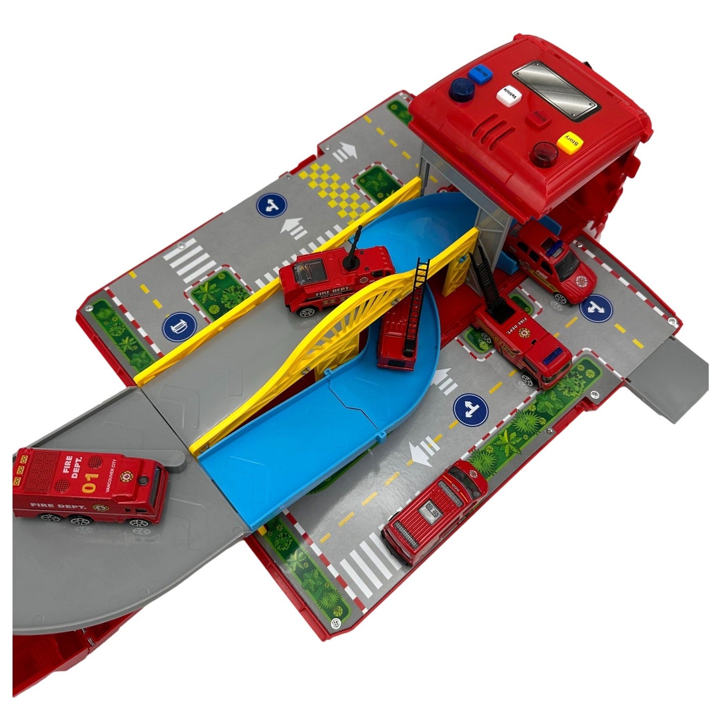 Toy fire station with miniature fire trucks, ramps, and buttons.