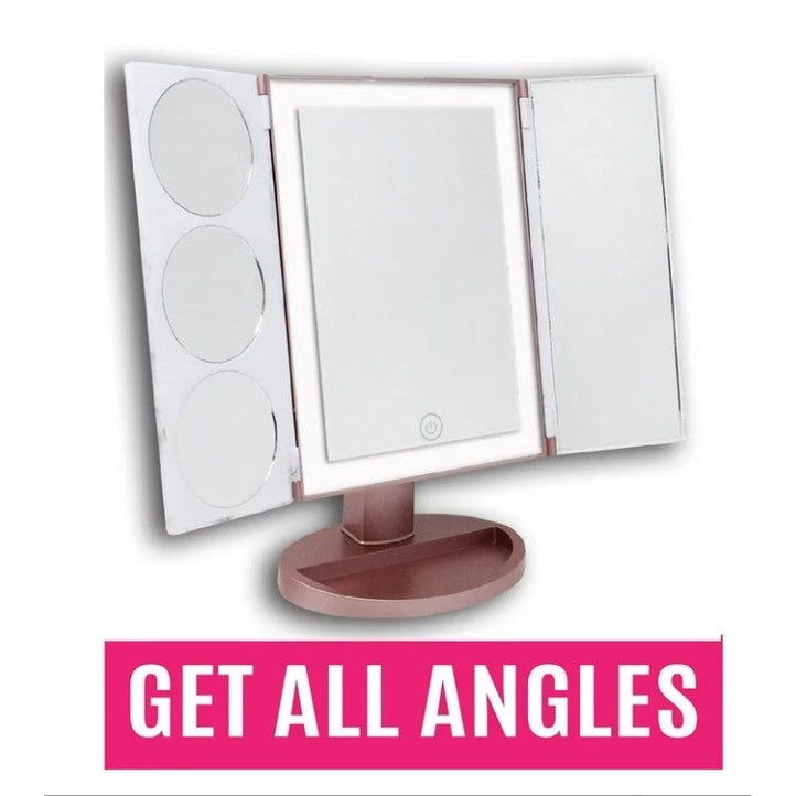 Rose gold lighted makeup mirror with magnification.