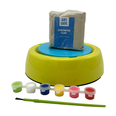 Product image of a pottery wheel, synthetic clay, paint set, and paintbrush against a white background.