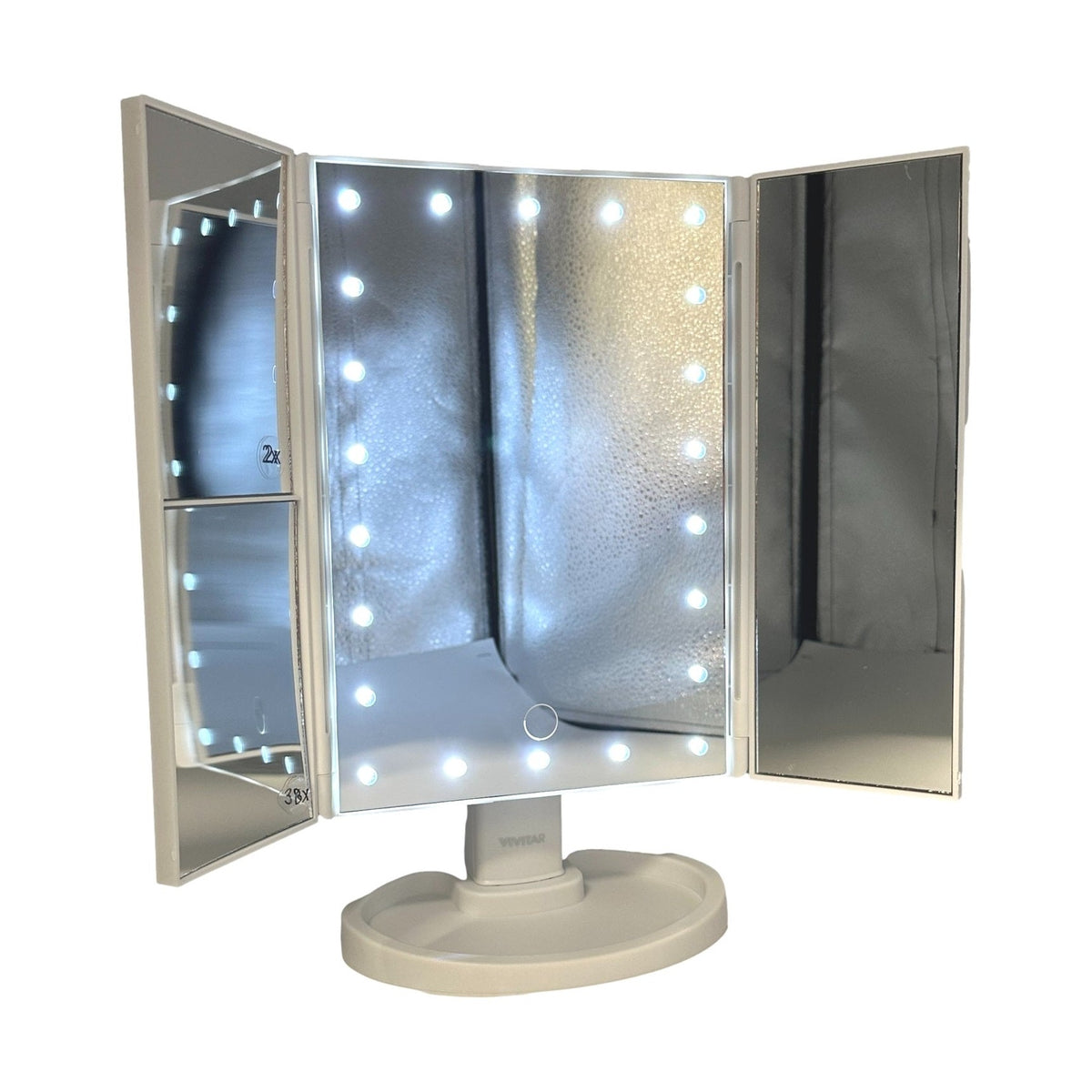 White tri-fold lighted makeup mirror with storage base.