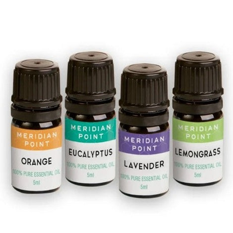 Four small essential oil bottles.
