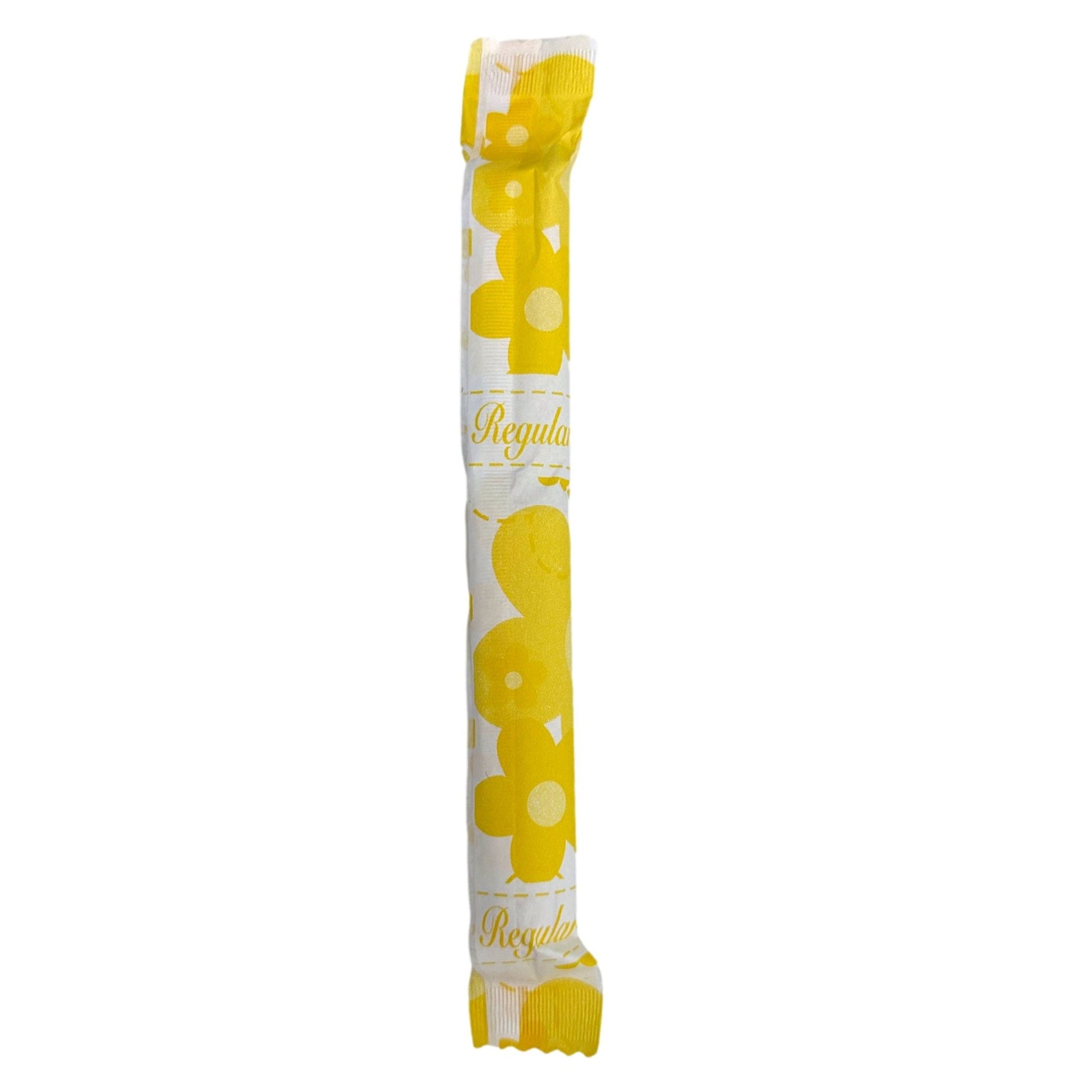 Wrapped regular tampon with yellow flower pattern.