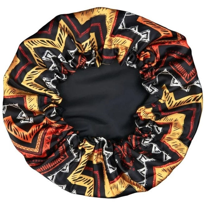 REVERSIBLE TRIBAL PRINT SATIN CAPP