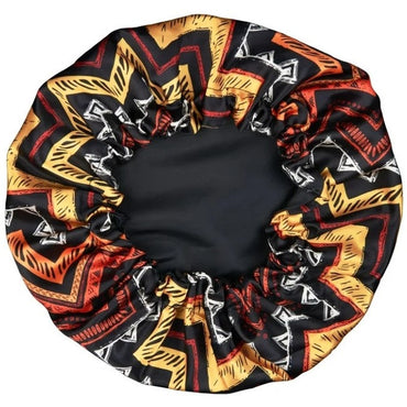 Black hair bonnet with an orange, yellow, red, and white zigzag pattern.