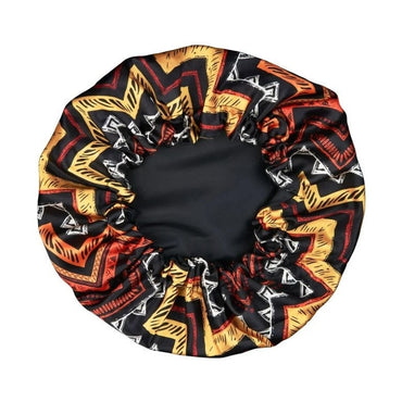Black hair bonnet with an orange, yellow, red, and white zigzag pattern.