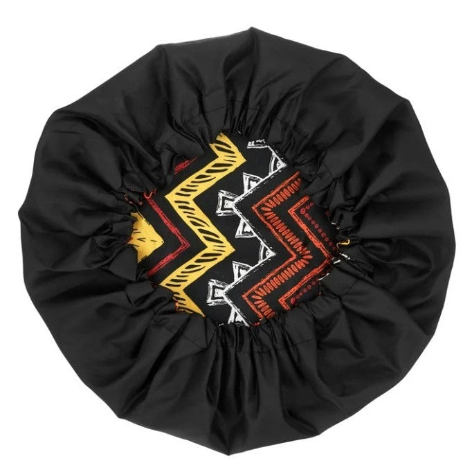 REVERSIBLE TRIBAL PRINT SATIN CAPP