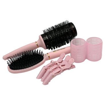 Hair care set with pink brushes, rollers, and clips.