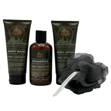 Three bottles of RBX men's body care products, with a grey loofah.