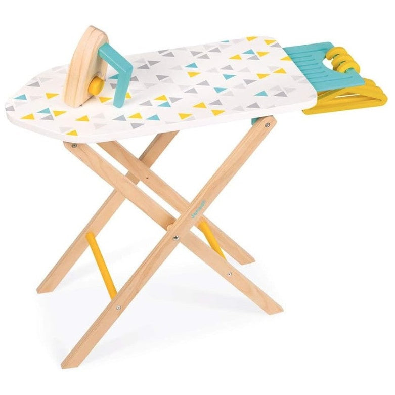Toy ironing board with wooden legs and triangular pattern on the surface.