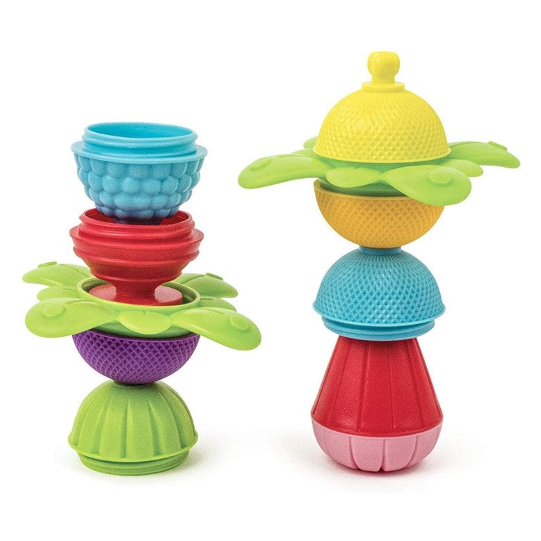 Two stacked toys with flower-petal shapes, colorful plastic.