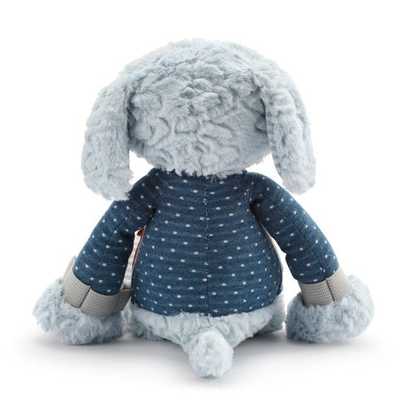 Light blue plush rabbit wearing a blue polka-dotted coat.