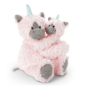 Two pink unicorn stuffed animals hugging, one larger than the other.