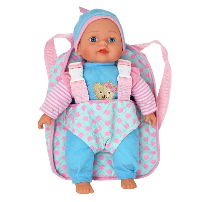 Doll with blue eyes, wearing a blue and pink polka dot carrier.