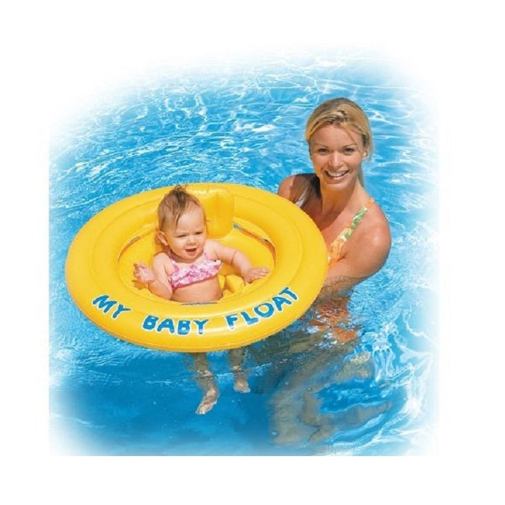 A baby in a pink bathing suit floating in a yellow float with a woman in the water.