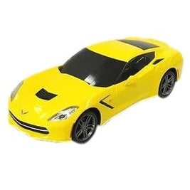 Here are some descriptive alt tags for the image:
* **Yellow toy sports car.**
* **Miniature yellow Corvette.**
* **Small, bright yellow toy car with black details.**