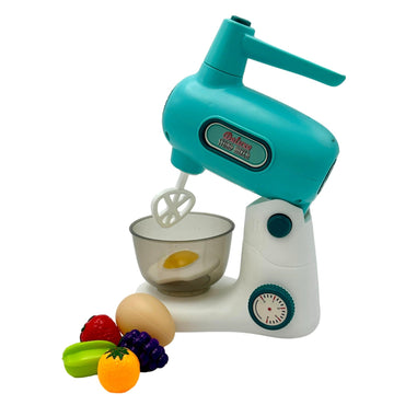 Toy stand mixer with toy egg and fruit.