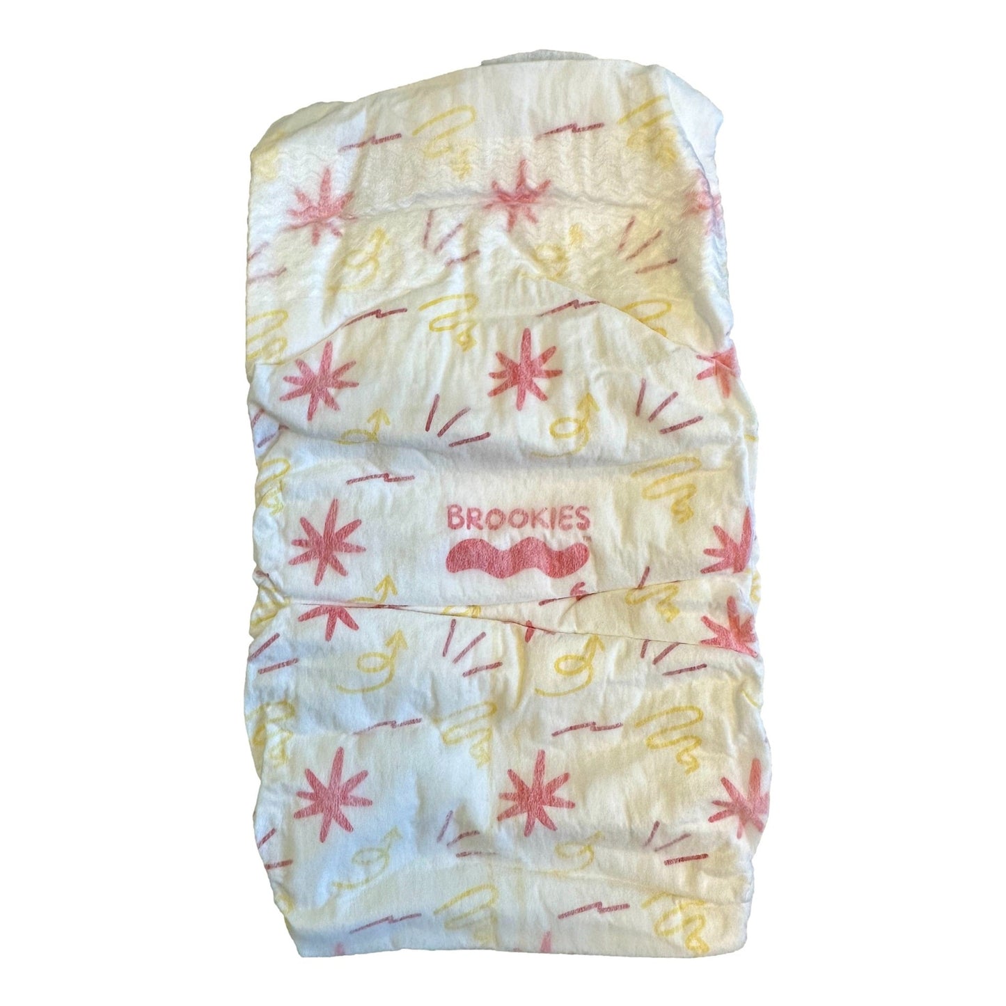 Folded Brookies brand diaper with star and doodle print.