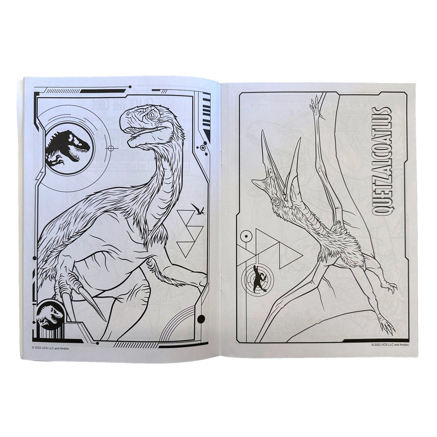 Open coloring book with dinosaur illustrations.