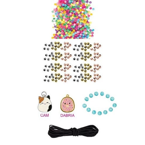 A collection of craft supplies to make bracelets. The kit includes colorful seed beads, gold-toned beads, a black cord, and various charms.