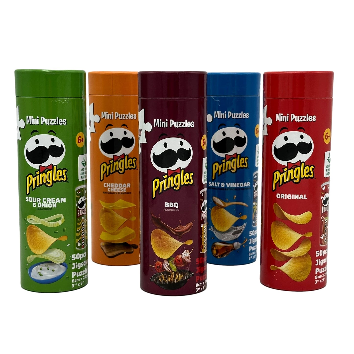Five cylindrical containers of Pringles "Mini Puzzles" in various flavors. Flavors are Sour Cream & Onion, Cheddar Cheese, BBQ, Salt & Vinegar, and Original. Each container has the iconic Pringles logo.