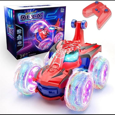 Red and blue toy car with light-up wheels, remote control, and packaging.
