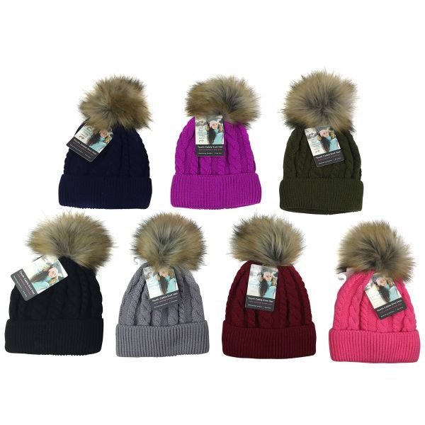 Eight cable-knit beanies with faux-fur pom-poms in various colors.