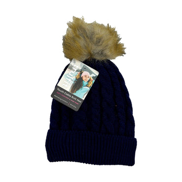Navy blue cable knit hat with brown faux fur pompom and a tag.