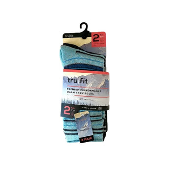 A pack of Trufit Premium Performance warm crew socks in light blue with dark blue stripes, hung on a black hanger, featuring a product label with mountains in the background.