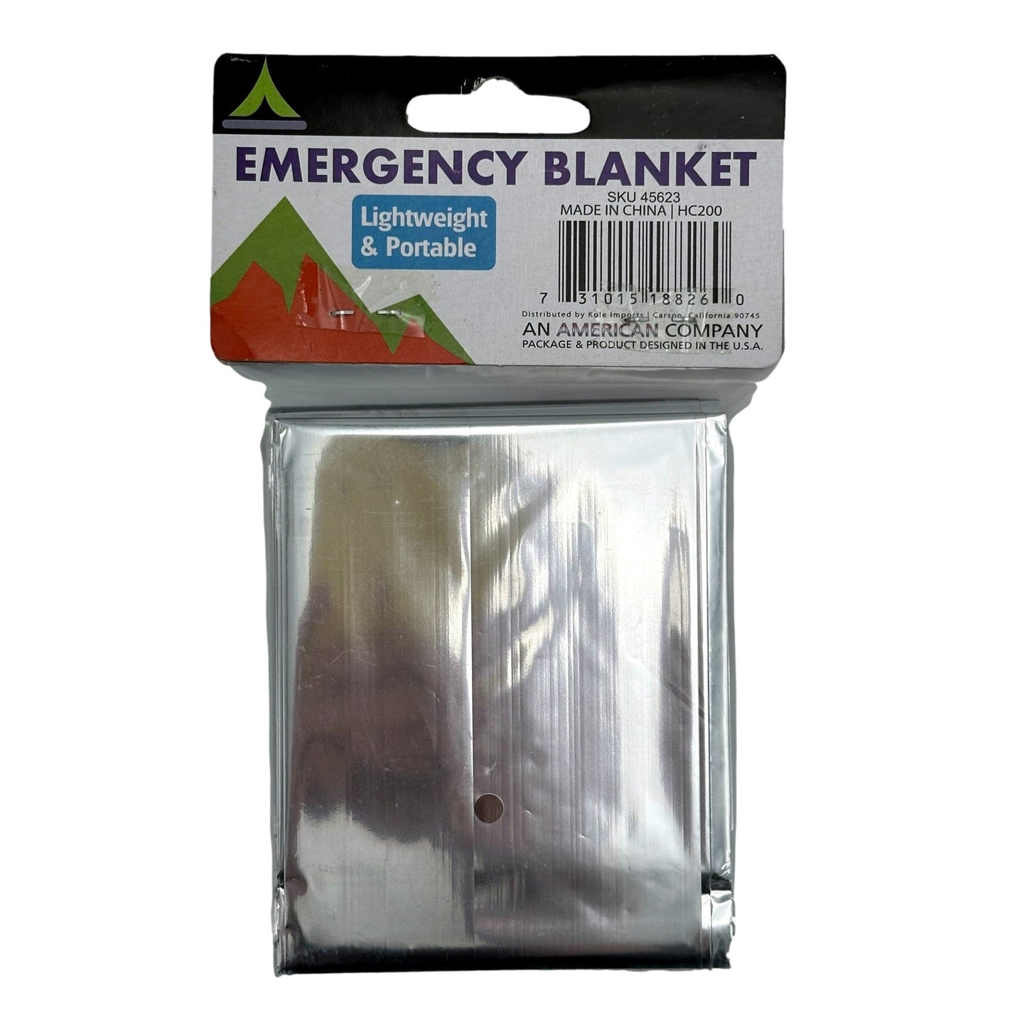 Packaged emergency blanket with a metallic silver finish.