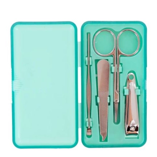 Open mint-green manicure set.