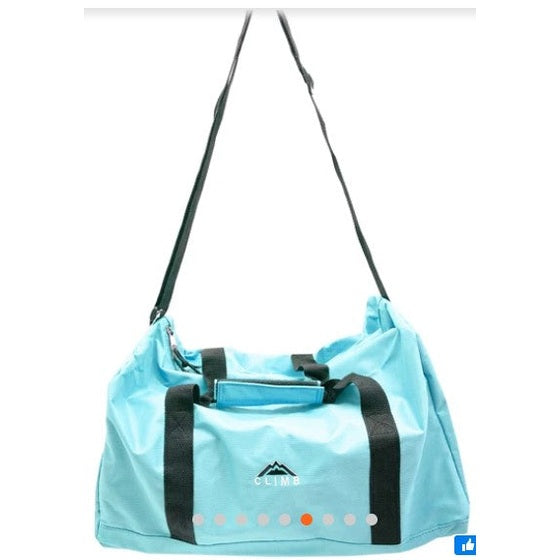 Light blue duffel bag with black straps.