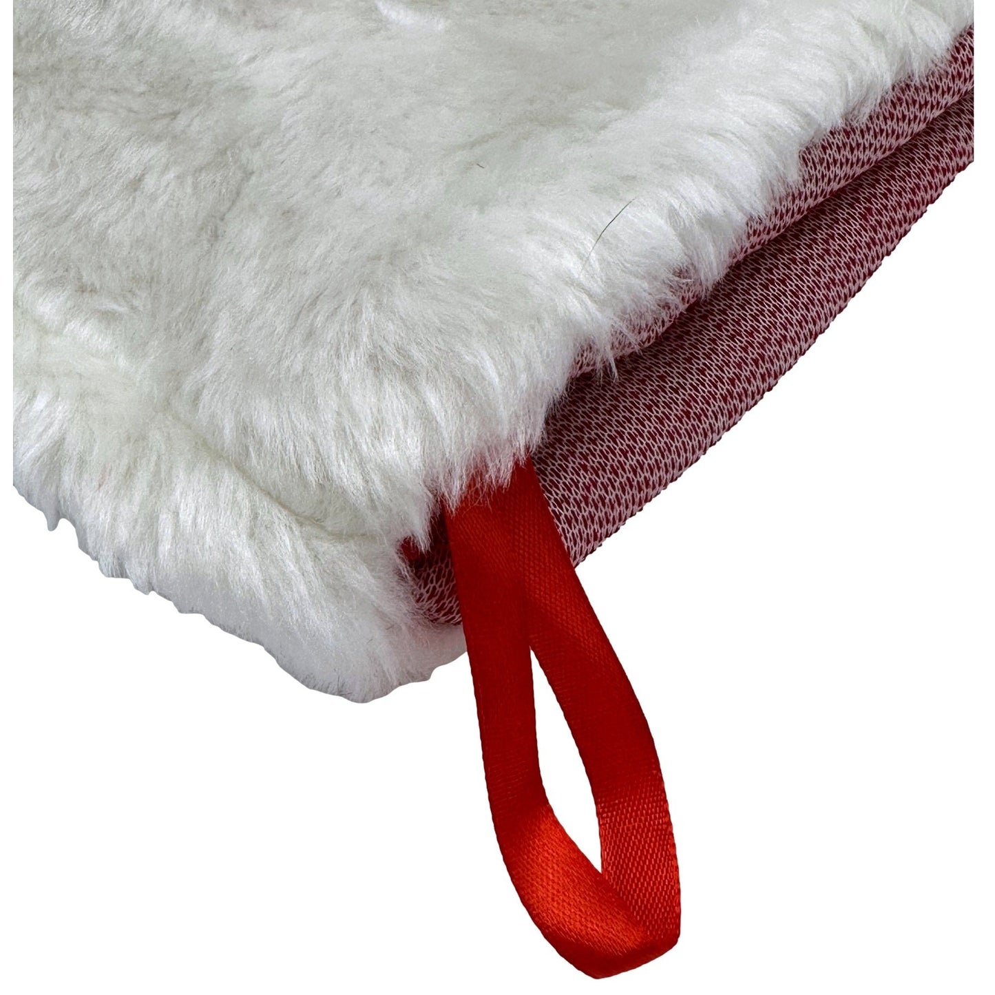 Close-up of a red and white Christmas stocking.