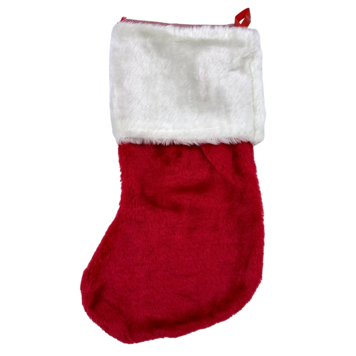 Red and white furry Christmas stocking.