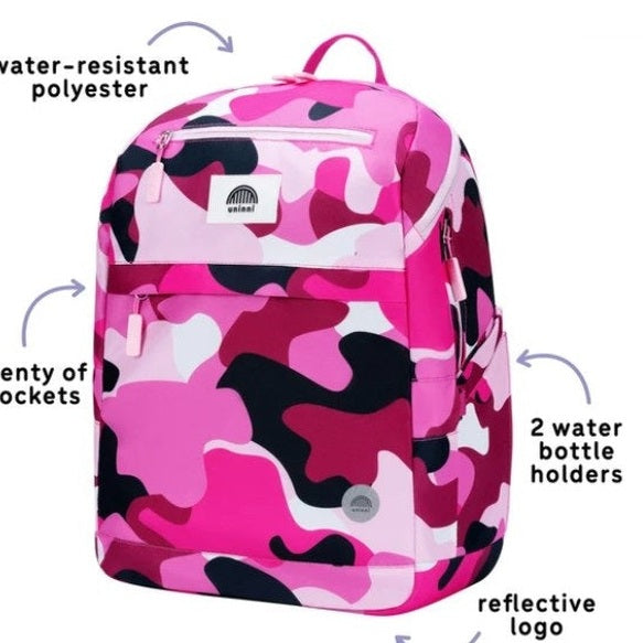Pink camo backpack with product description labels.