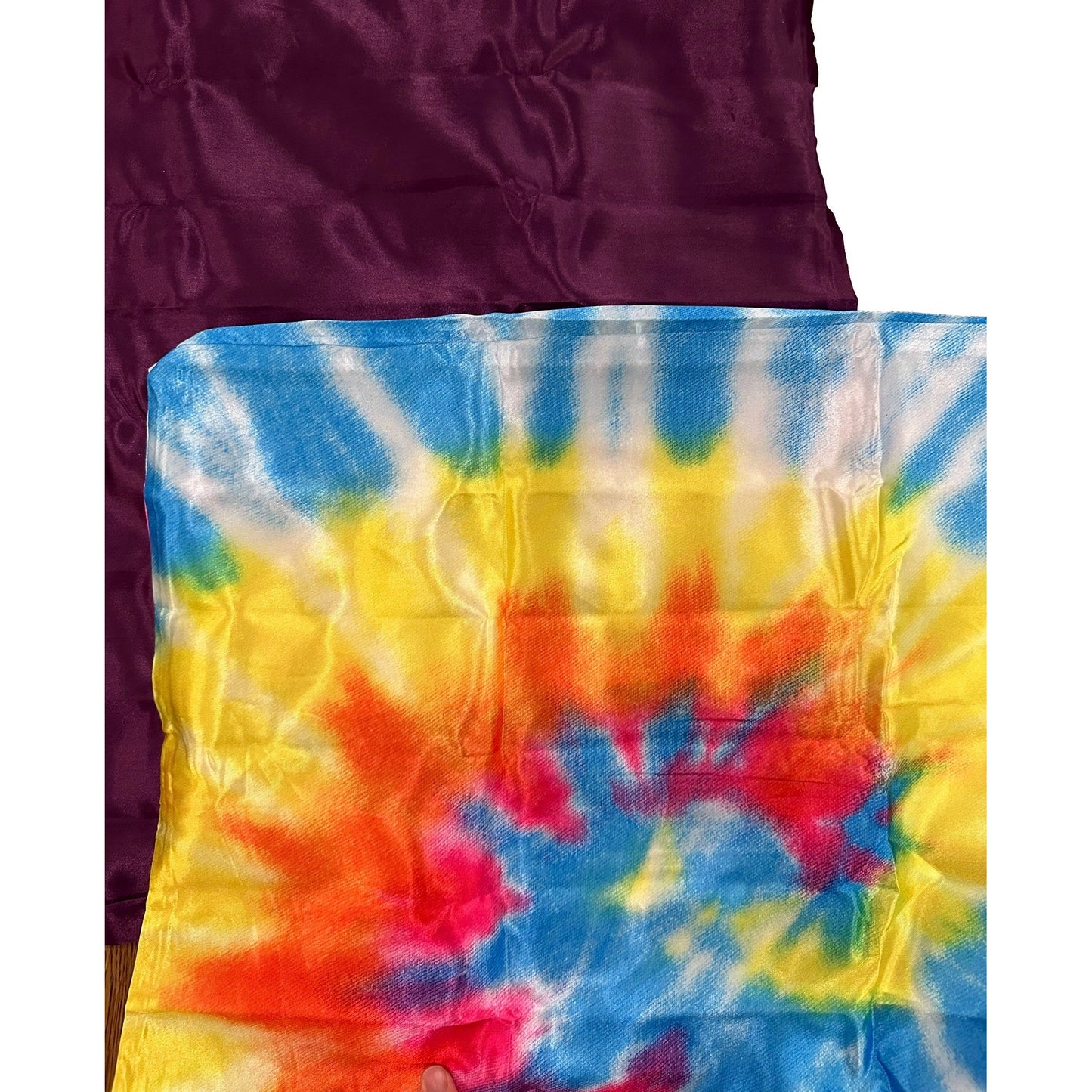 Purple and tie-dye fabric.