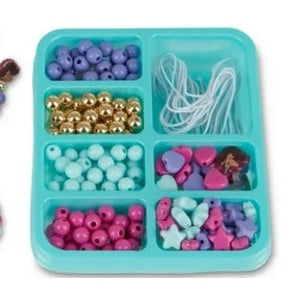 Here are some descriptive alt tags for the product image:
* **Bead bracelet making kit in a blue organizer tray with various colored beads and strings.**
* **Kids' jewelry making set with beads and bracelet samples.**
* **Close-up of a bead crafting kit featuring pastel-colored beads, strings, and completed bracelets.**
* **Brightly lit crafting kit with beads in compartments and finished bracelets to the side.**