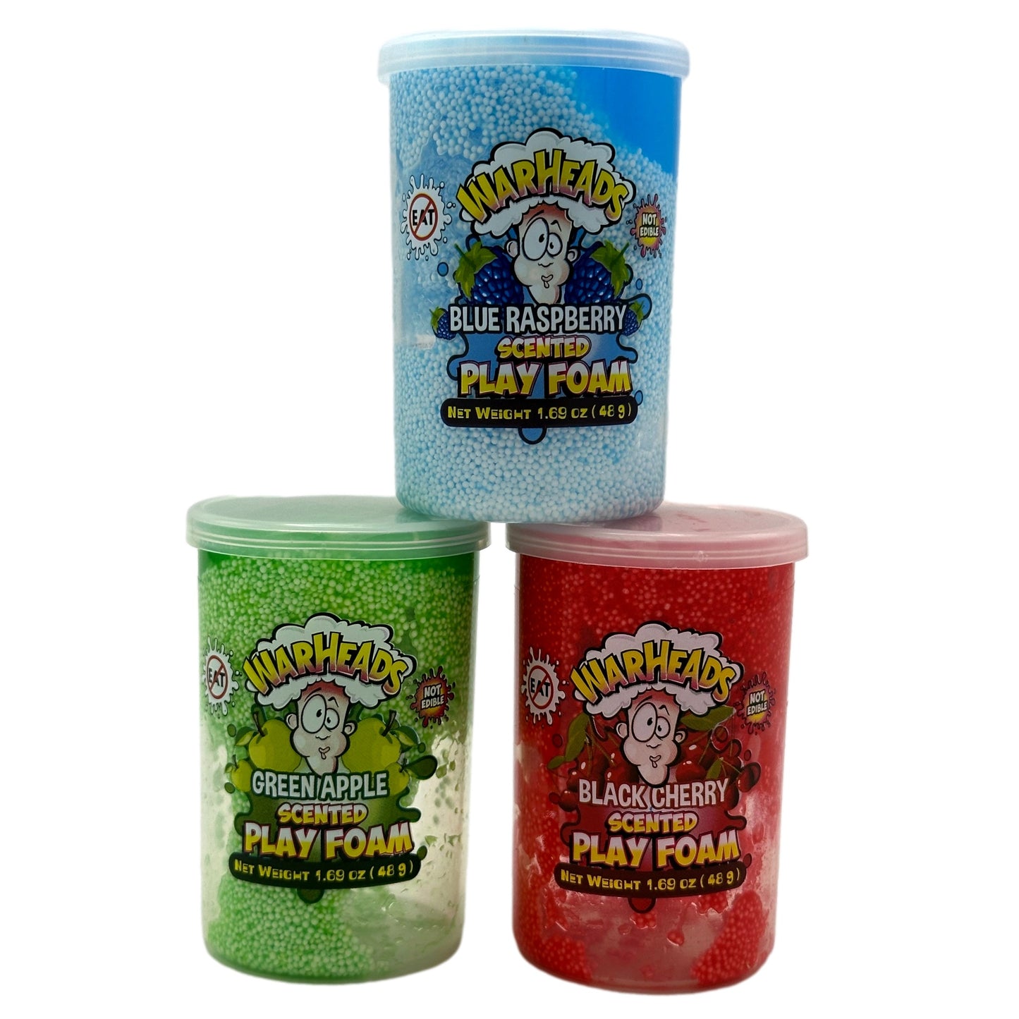 Three containers of Warheads-branded play foam. The flavors are blue raspberry, green apple, and black cherry, and the containers are stacked.