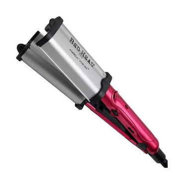 Silver and pink Bed Head hair waver.