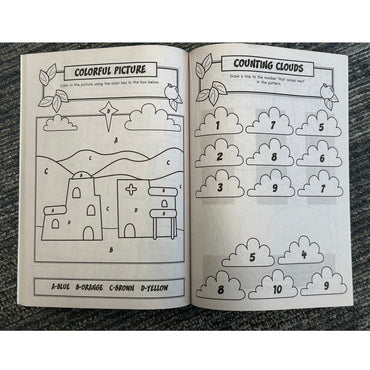Open coloring/activity book on carpet.
