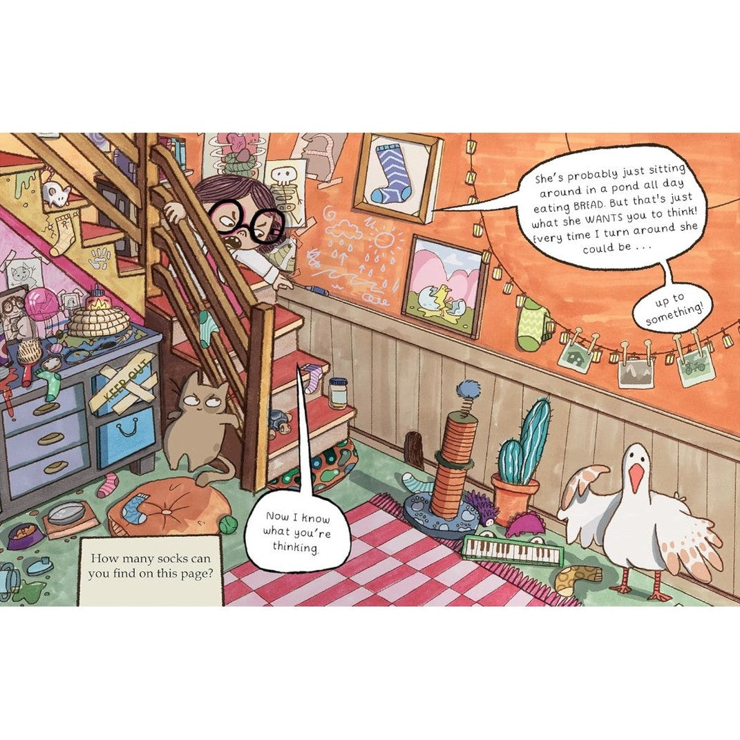 An illustration shows a messy room with a girl standing on a wooden staircase. A cat is on the first floor, and a seagull is on the floor to the right. There are socks pictured in a frame on the wall, hanging from a string, on a cat bed, and in a pile. Text asks the viewer to count how many socks are in the image.