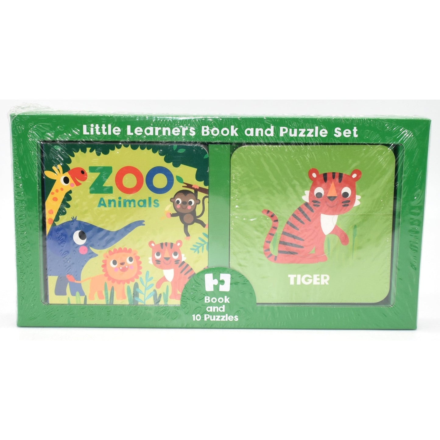 A "Little Learners Book and Puzzle Set" is displayed in its original packaging. On the left, a book cover titled "ZOO Animals" features cartoon illustrations of zoo animals against a light green backdrop. To the right, a puzzle card with an illustration of a cartoon tiger against a green background is labeled "TIGER". The box has a green background and reads "Book and 10 Puzzles".