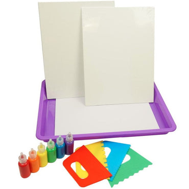 Paint pouring kit with canvases, paint, tray, and scrapers.