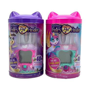 Two "Got2Glow Fairy Pet Finder" toys, one purple and one pink, in clear plastic containers with cat-ear lids.