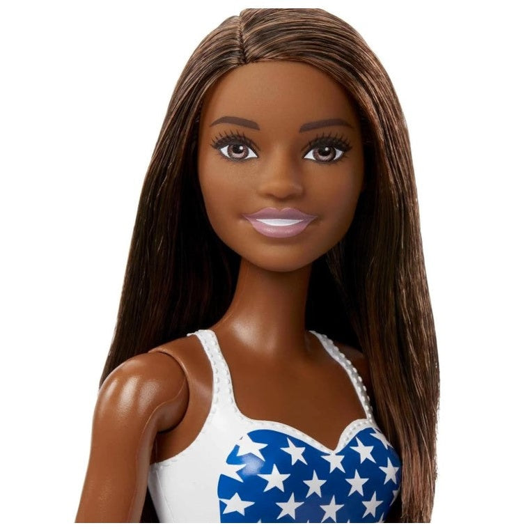 Dark-skinned Barbie doll in a white and blue star-spangled top.