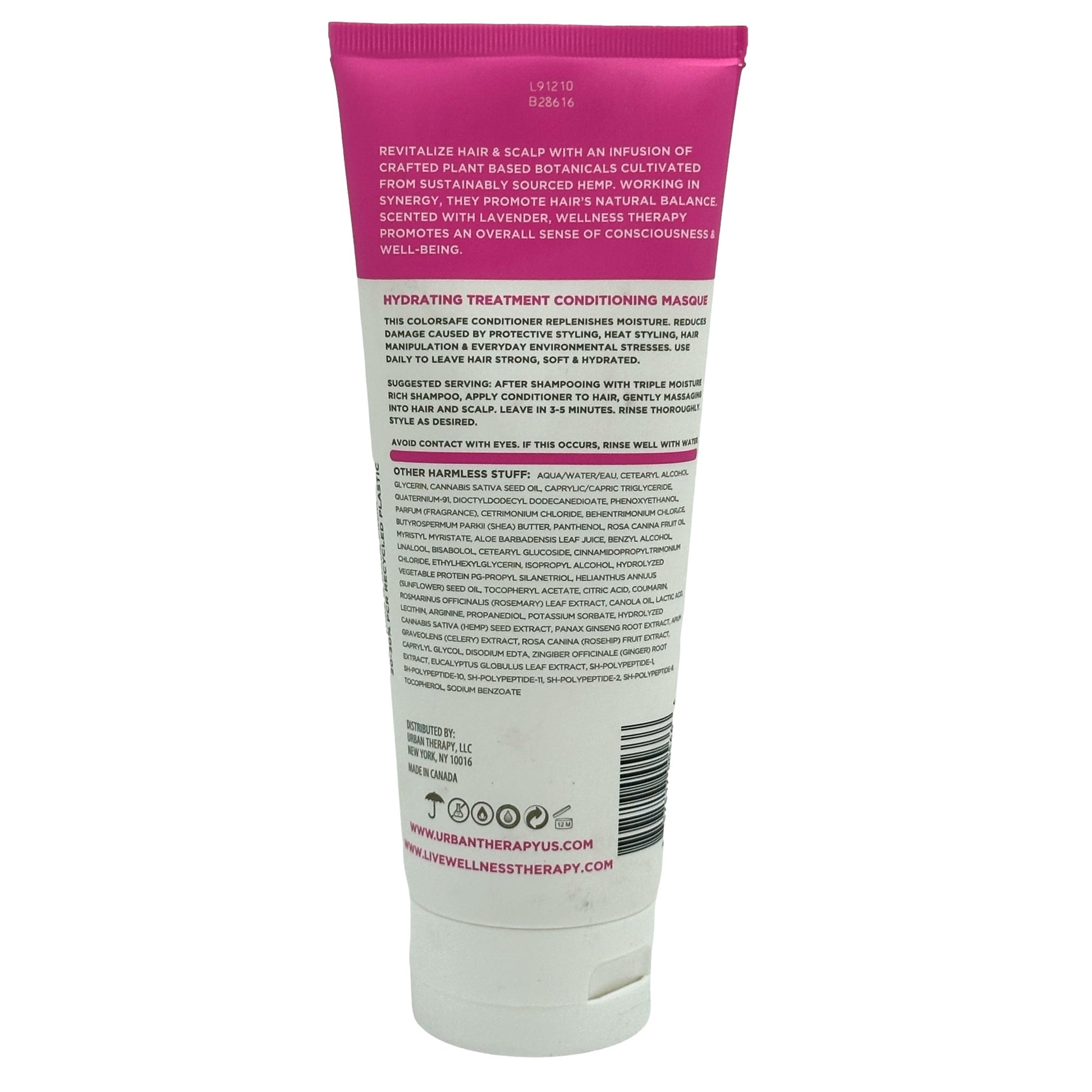 Pink and white tube of hair conditioner.