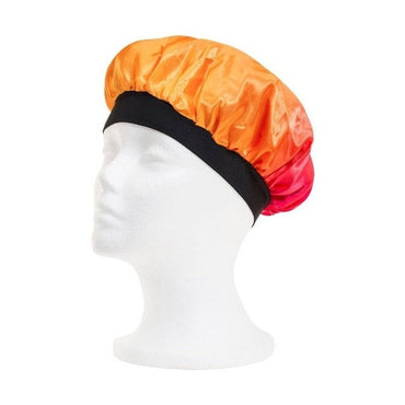 Satin hair bonnet in orange and red with a black elastic band, displayed on a white mannequin head.