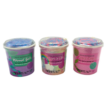 Three containers of DIY bath bomb kits, labeled "Mermaid Goals," "Unicorn Dreams," and "Sugar Sugar."