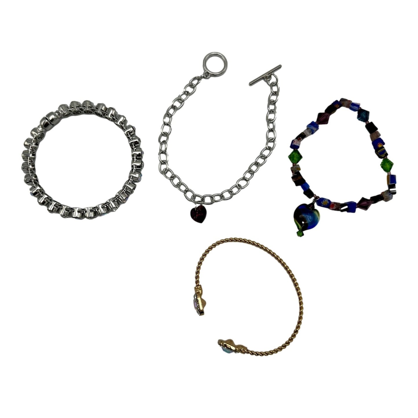 Four bracelets, silver, gold, and colorful beads.