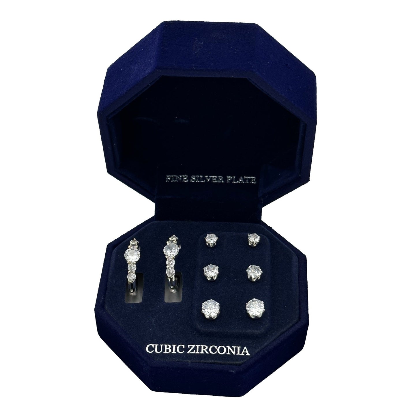 Open, blue velvet jewelry box with silver-plated cubic zirconia earrings.
